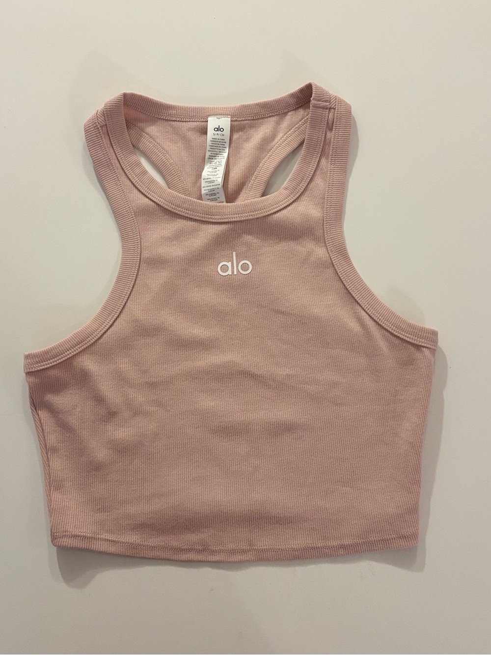 ALO Yoga Aspire Ribbed Racerback Crop Top in Blush Pink